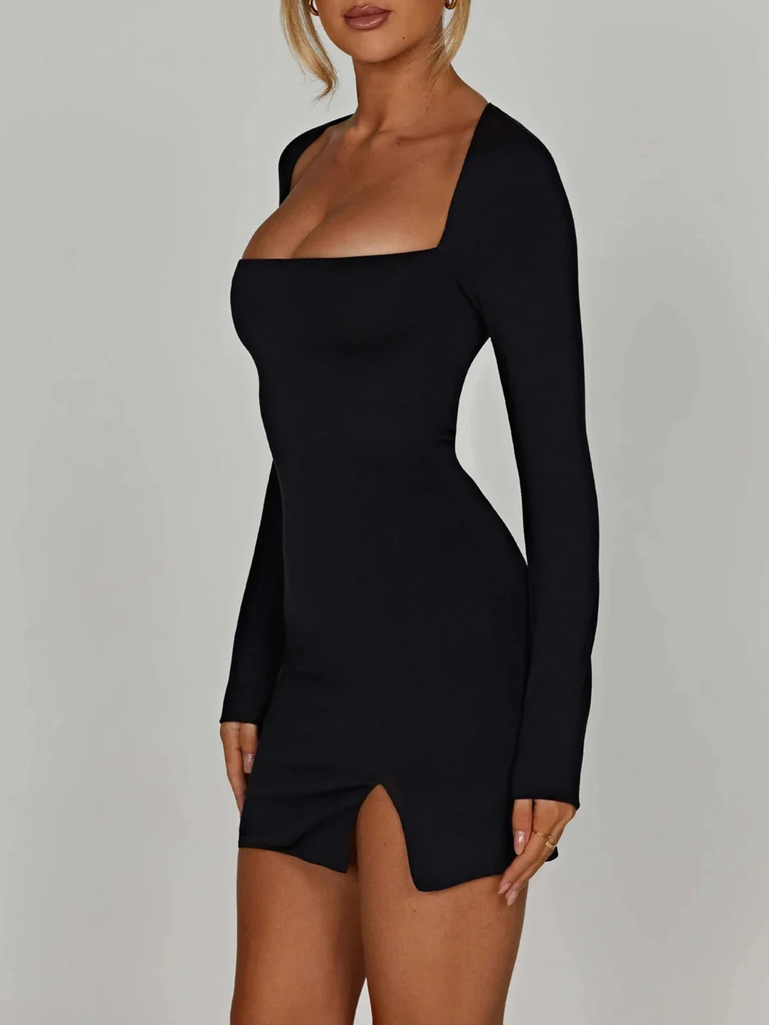 Mini dress with small slit and open back design - NELLY