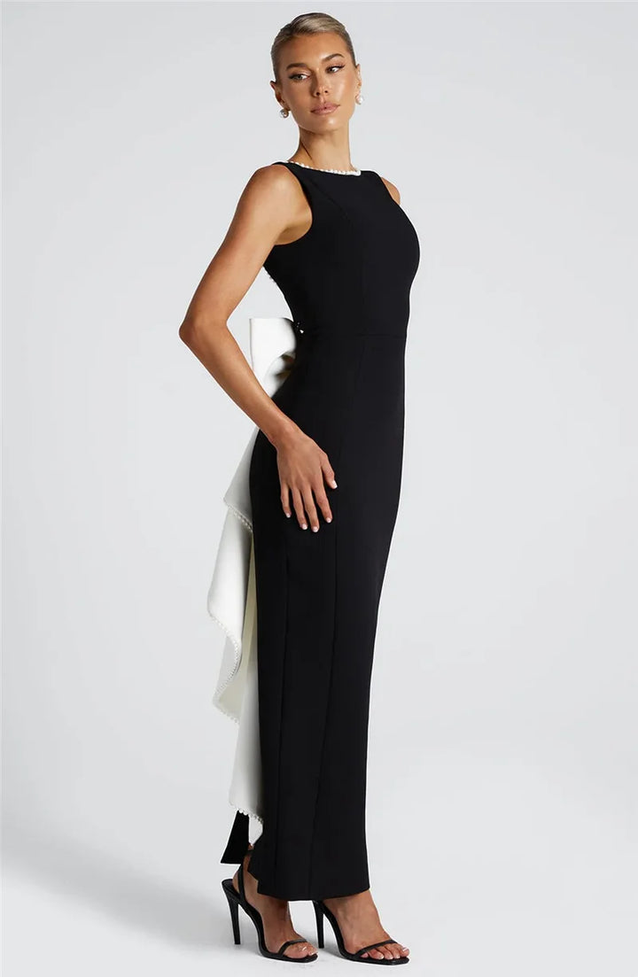 Elegant maxi dress with open back, bow, and pearl decoration - Alberta