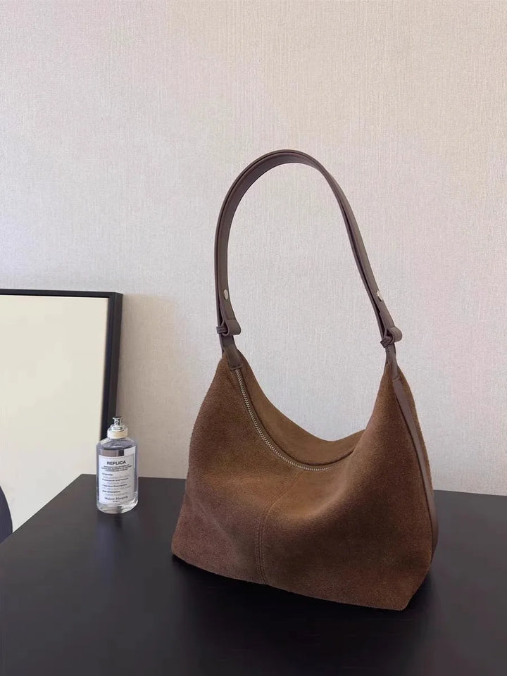 Suede bag with classic design