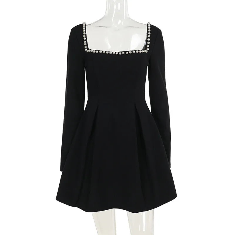 A-line mini dress decorated with pearls - Cory
