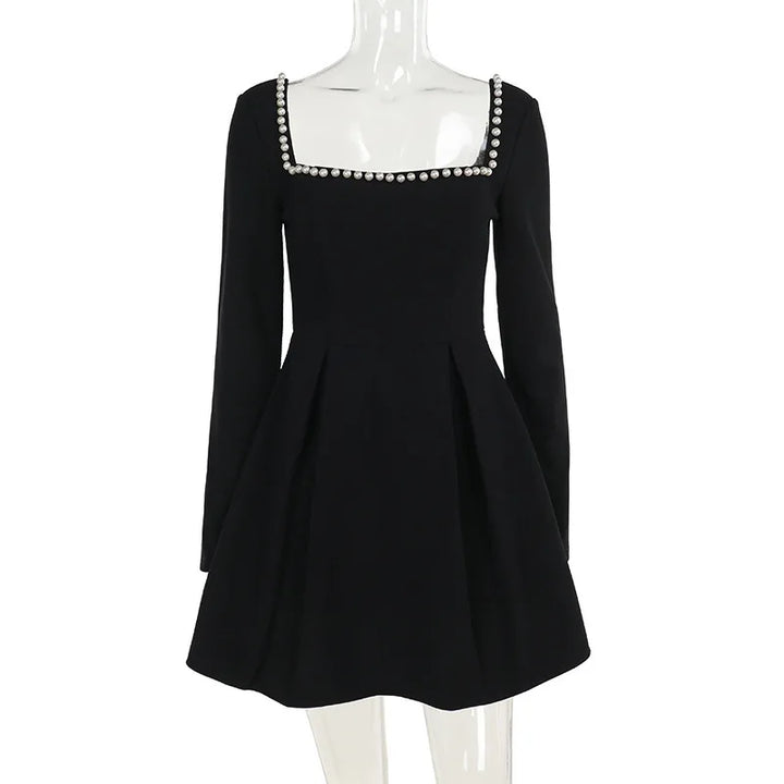 A-line mini dress decorated with pearls - Cory