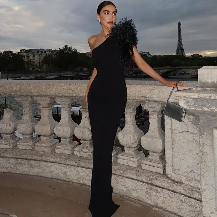 Elegant one-shoulder maxi evening dress decorated with feathers - Talia