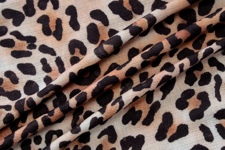 Fitted leopard print mini dress with lace decoration - Goni