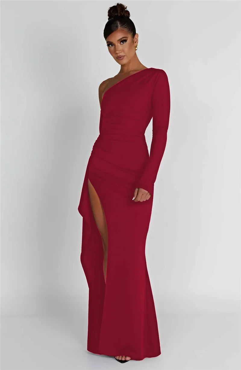 Ruffled maxi dress with shoulder slit and off-shoulder design - Melania