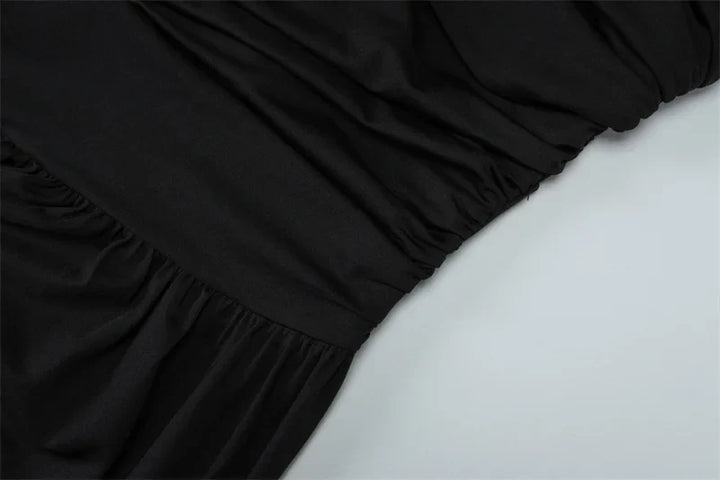 Elegant maxi pleated dress with one shoulder exposed - Maylin