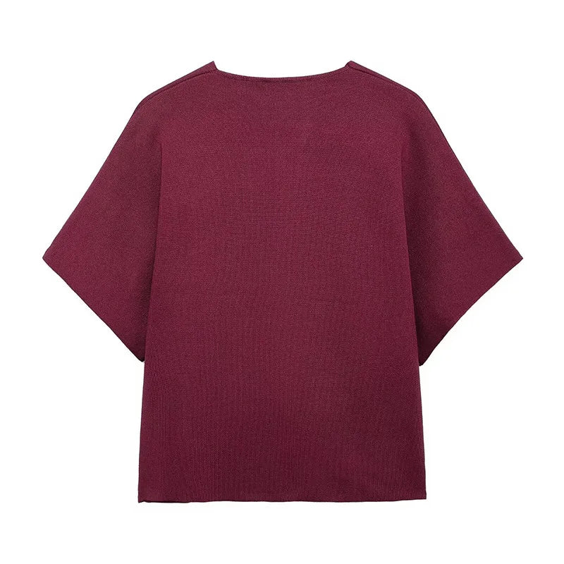 Elegant sweater with gold button decoration - Nela