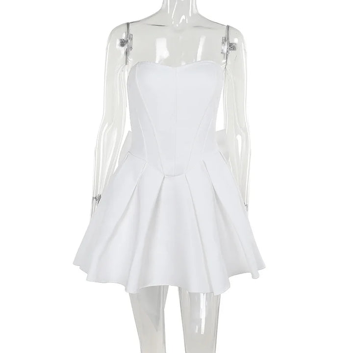 Strapless mini dress with bow detail on the back and added tulle underskirt - Novalee