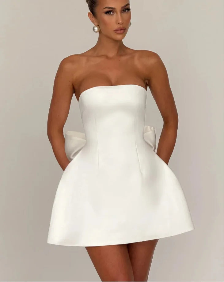 Satin mini dress in A-line cut with tie bow back detail for waist fit - Lilia
