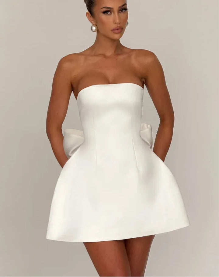 Satin mini dress in A-line cut with tie bow back detail for waist fit - Lilia