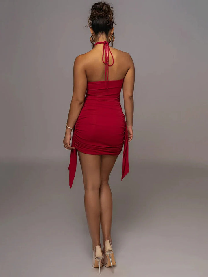 Ruched mini dress with neck tie and floral appliqué - Jasmina