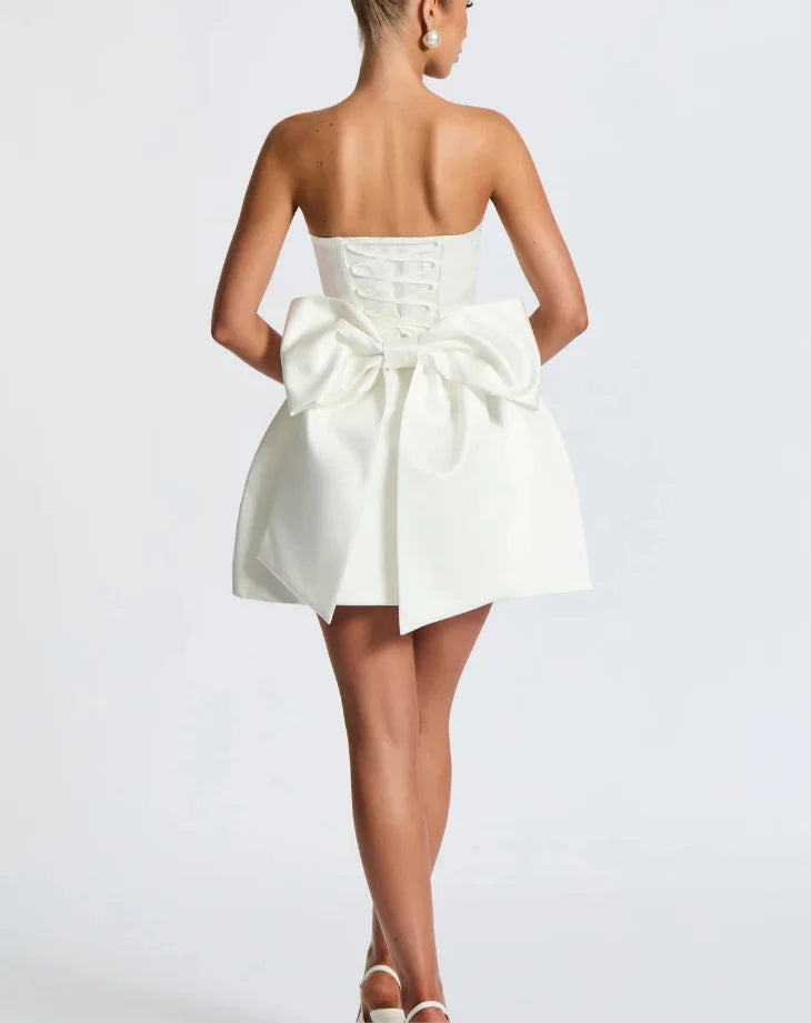 Satin mini dress in A-line cut with tie bow back detail for waist fit - Lilia