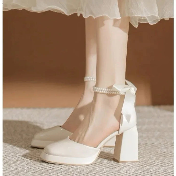 Shiny Faux Leather High Heels with Pearl and Bow Decoration - Vivian