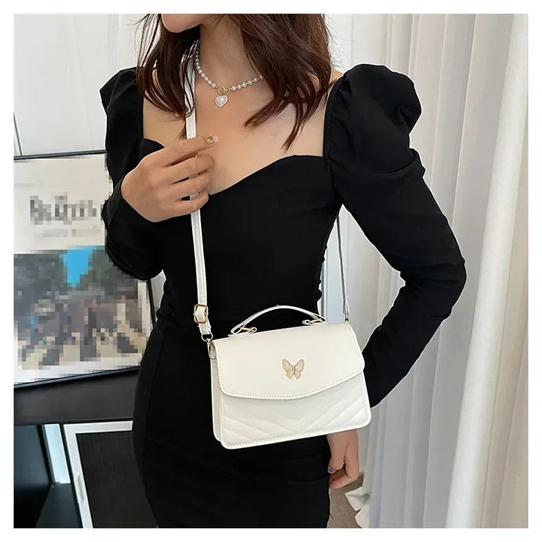 תיק דמוי עור בעיטור פרפר