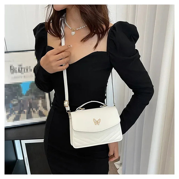 תיק דמוי עור בעיטור פרפר