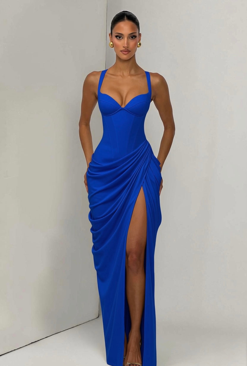 Layla maxi dress with a slit, pleats, corset design, back tie, and waist-cinching fit