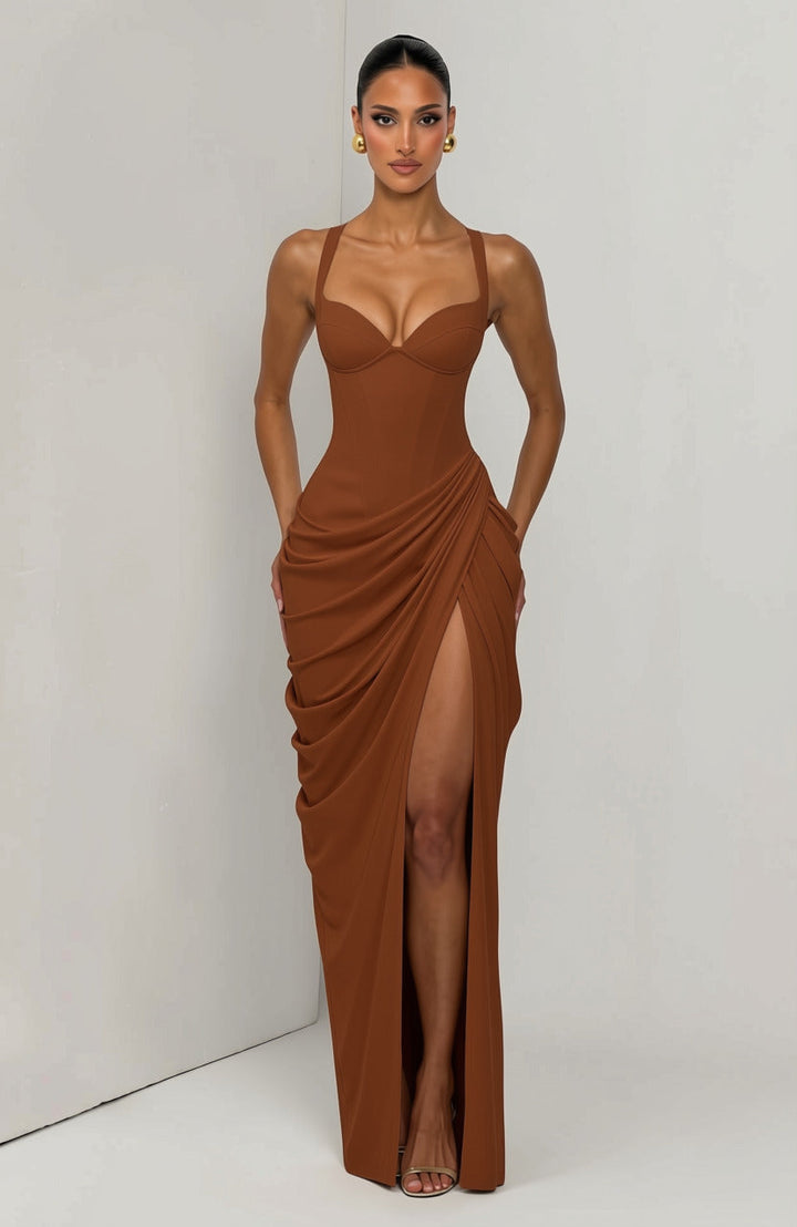 Layla maxi dress with a slit, pleats, corset design, back tie, and waist-cinching fit